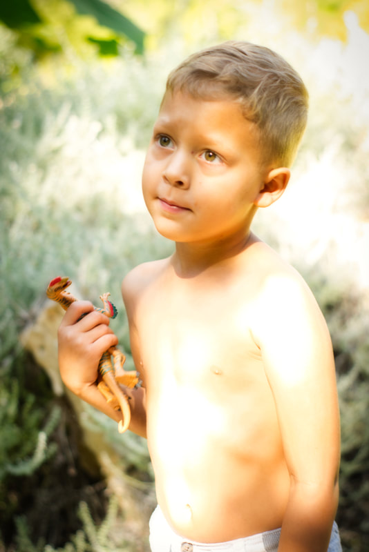 portrait of a boy at the Taft Botanical Garden in Ojai, CaPicture